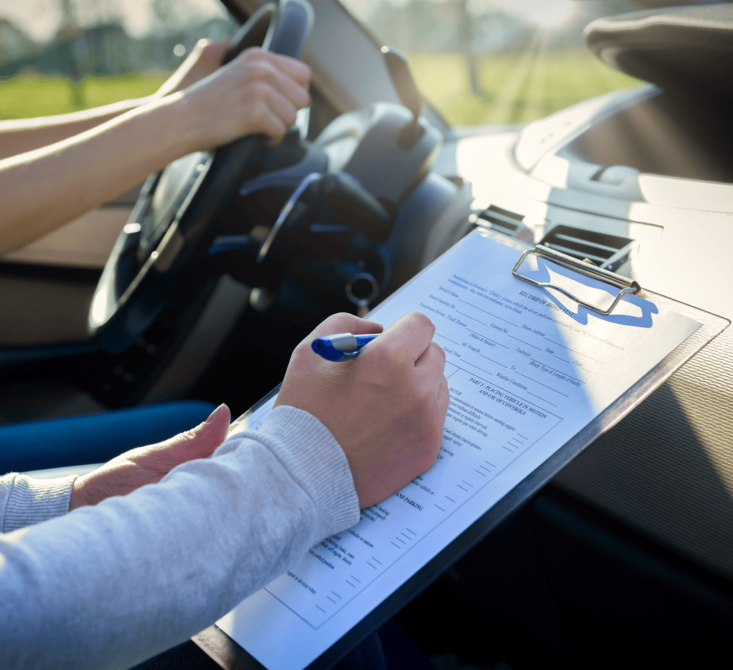 Driving test with clipboard and pen